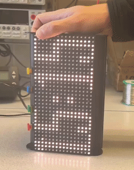 The displayed digits falling like sand as the clock rotates from horizontal to vertical.
