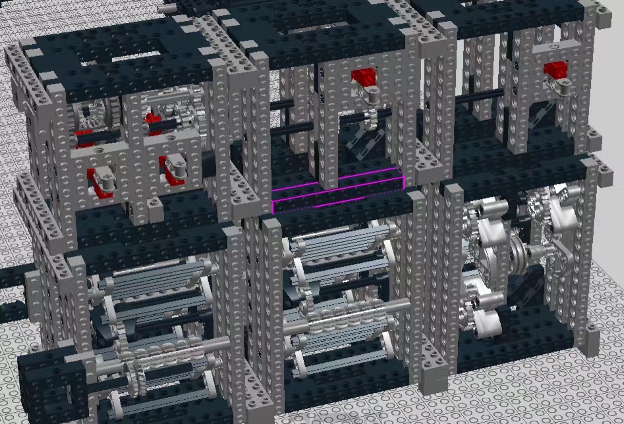 A close view of shafts, rollers, and gears in one module of the LEGO mechanical writer.
