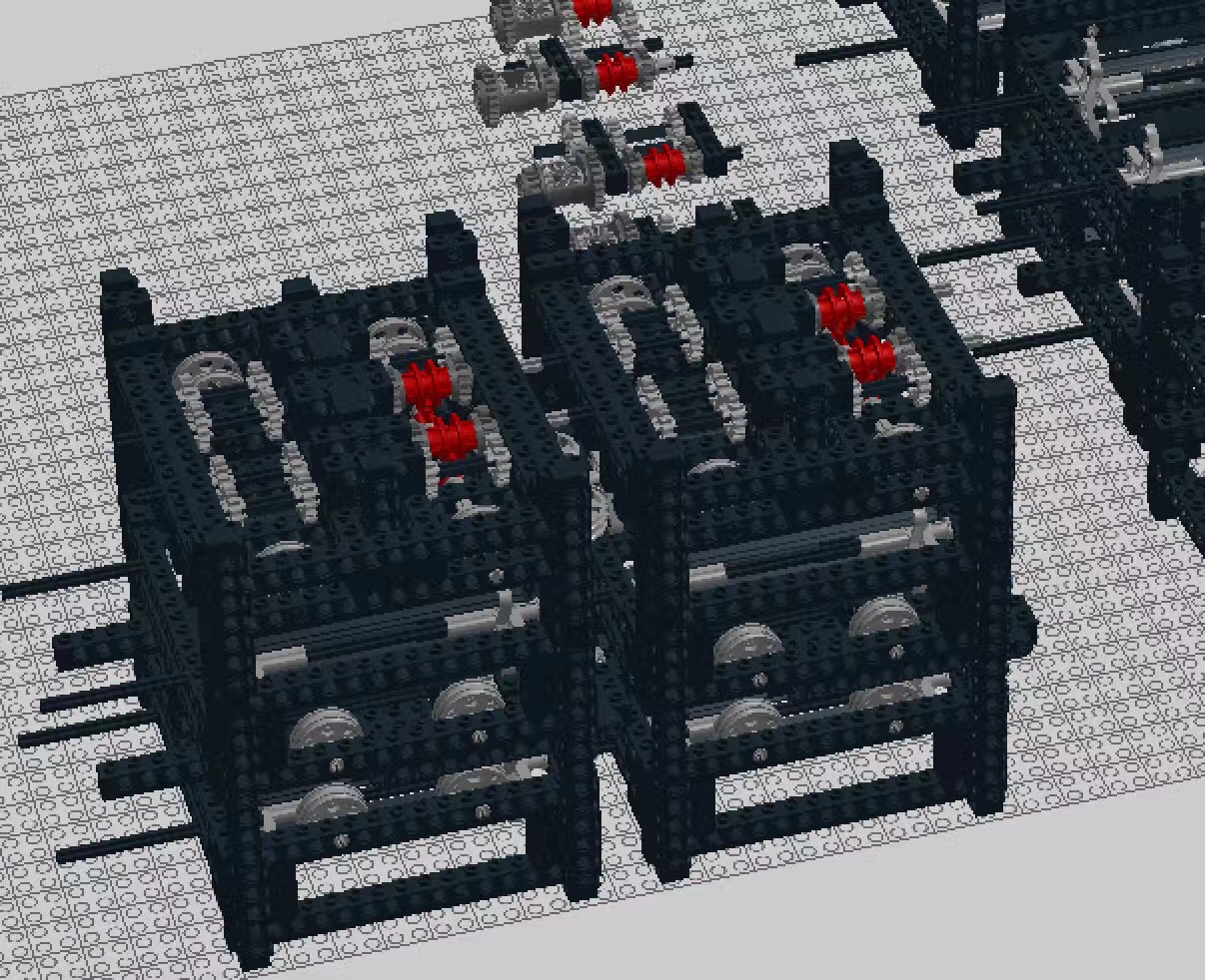 Two separate functional modules at the front of the LEGO mechanical writer.